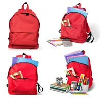 A set of red backpacks with school supplies on a white background.