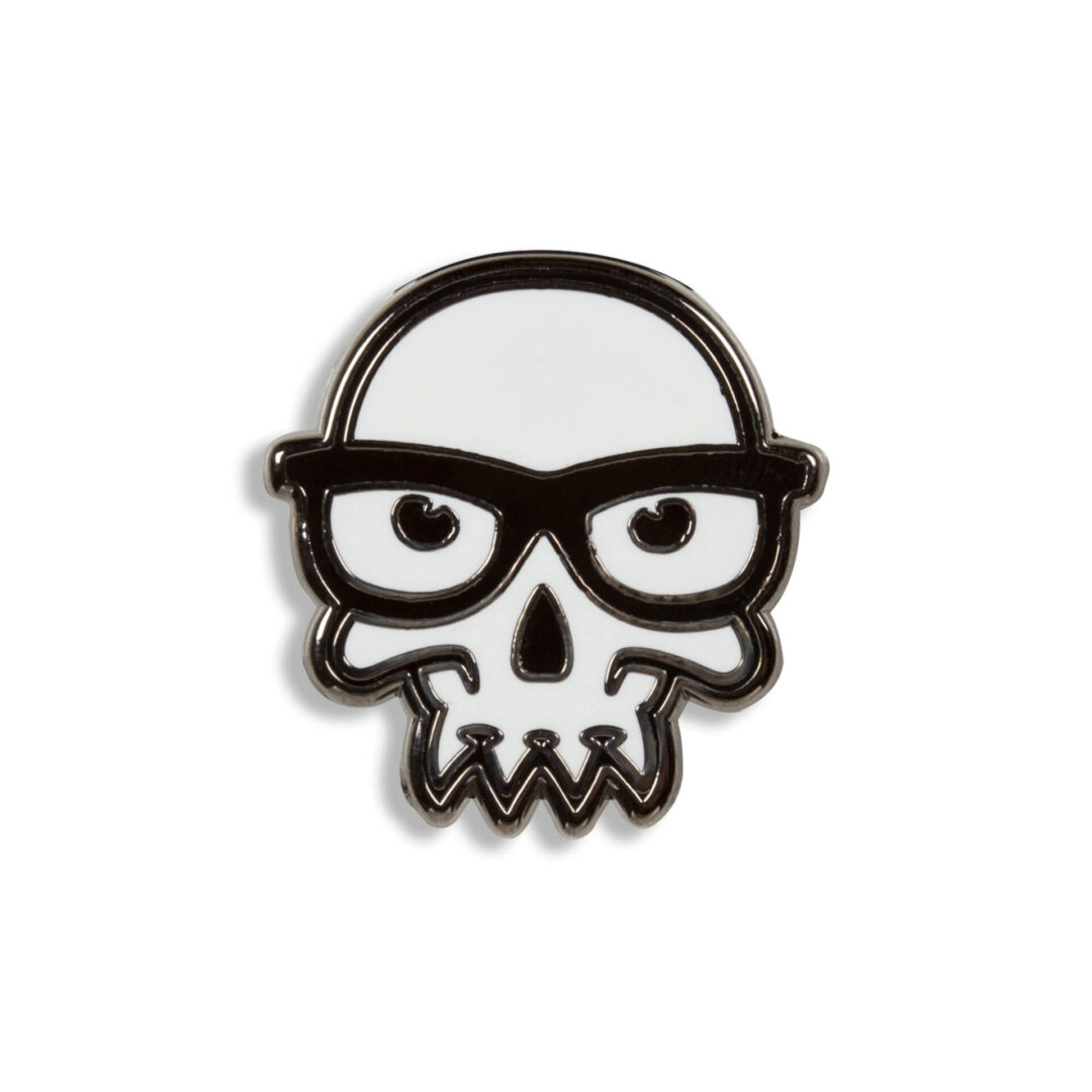 A black and white skull pin with glasses.