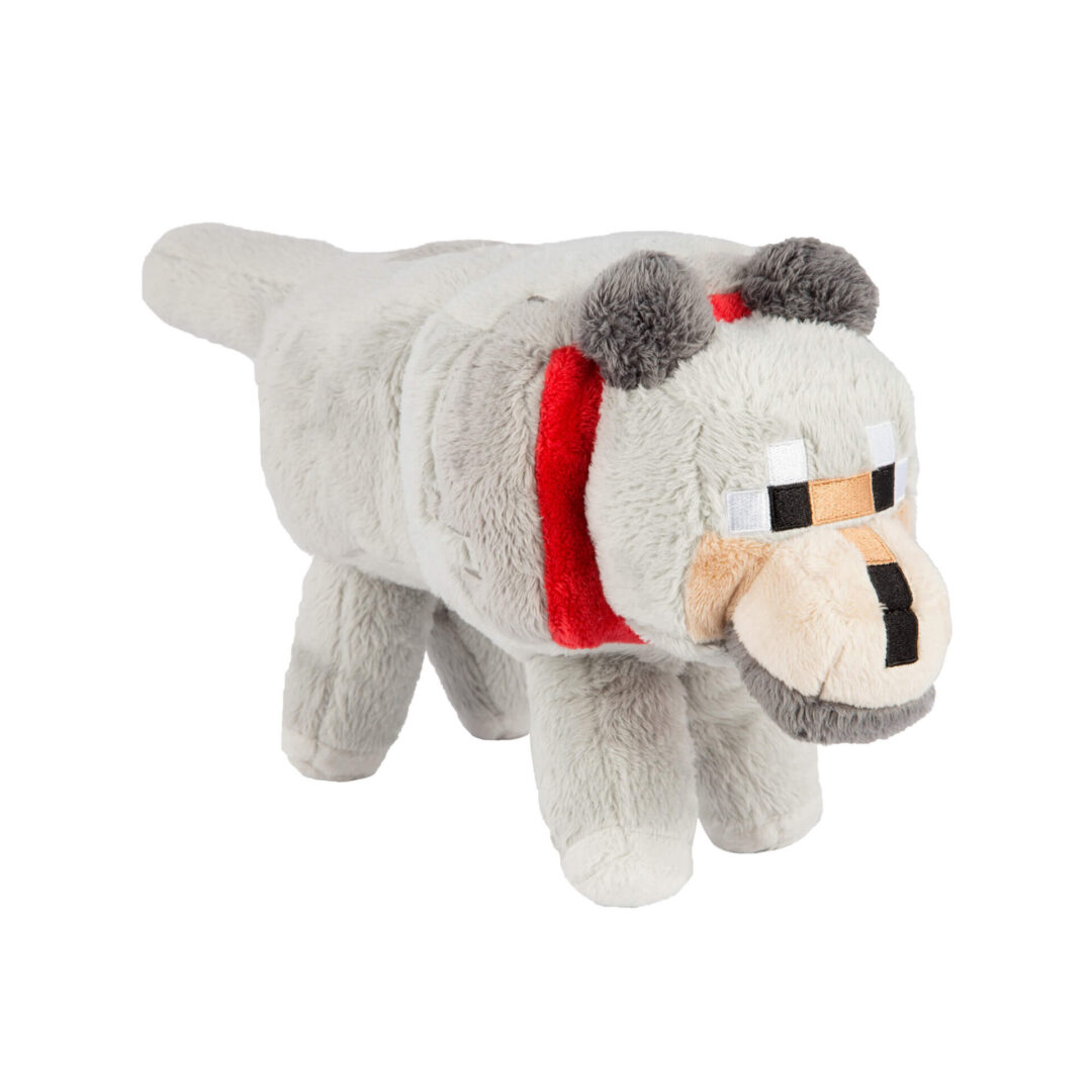 A grey stuffed animal with a red collar.